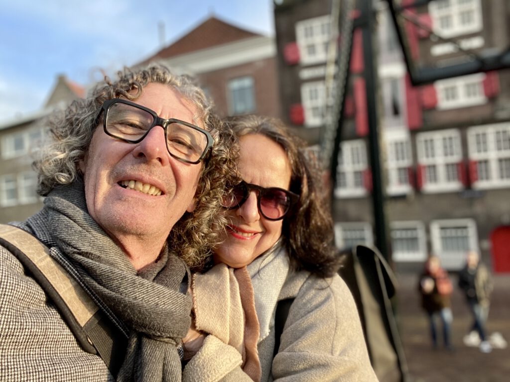 Romantic mature older couple during a winter walk in the old historical Dutch city of Dordrecht.